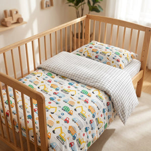 Parure de lit bébé motif Véhicules dans un berceau